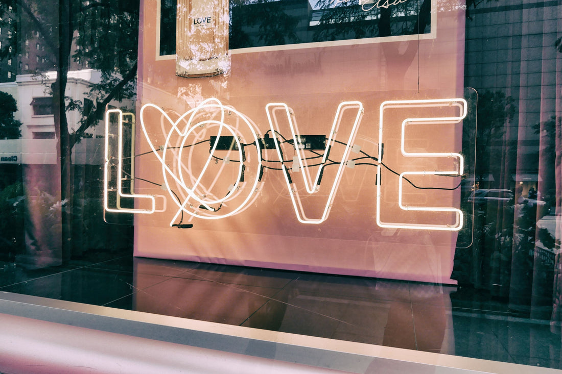 neon-love-sign-in-shop-window-bon-and-bear