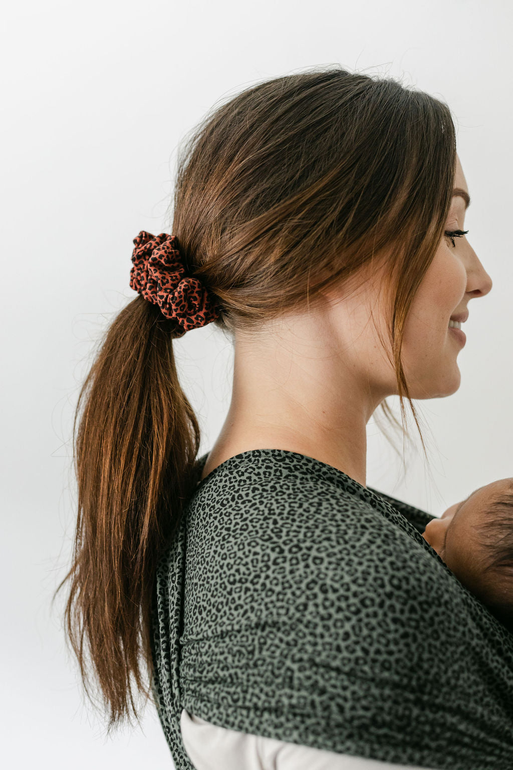 maple-leopard-print-scrunchie-tied-in-low-ponytail-with-mum-babywearing-bon-and-bear